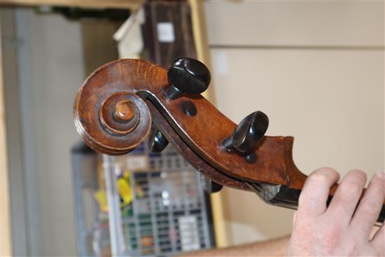 A cased cello with bow